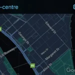 Biểu tượng kính lúp tìm kiếm trên giao diện Google Maps CarPlay