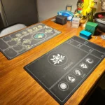 Hai tấm thảm chơi Magic The Gathering mua từ Temu, minh chứng cho các phụ kiện game chất lượng tương tự hàng địa phương.