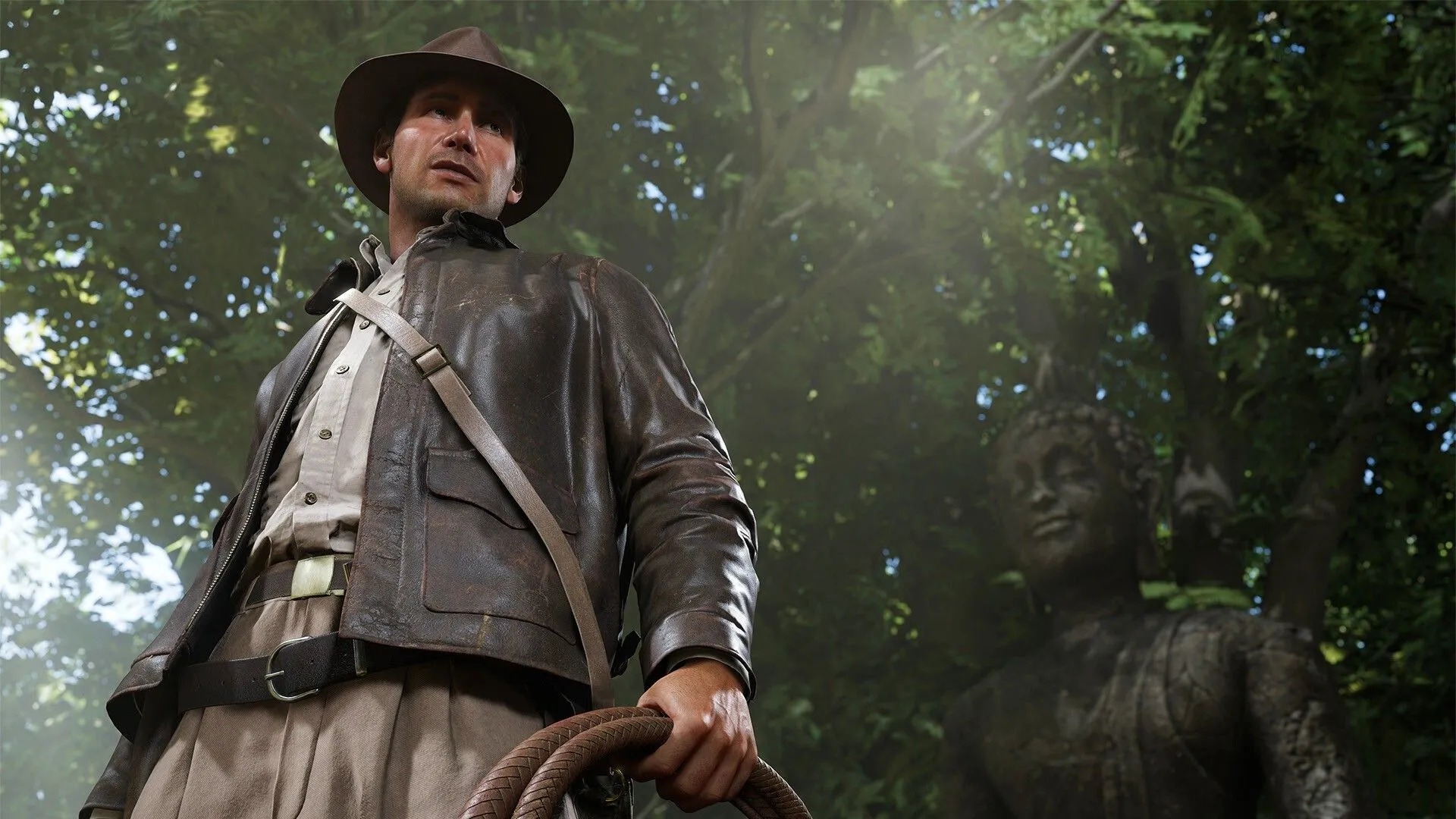 Indiana Jones cầm dây thòng lọng đứng cạnh tượng cổ trong Indiana Jones and the Great Circle