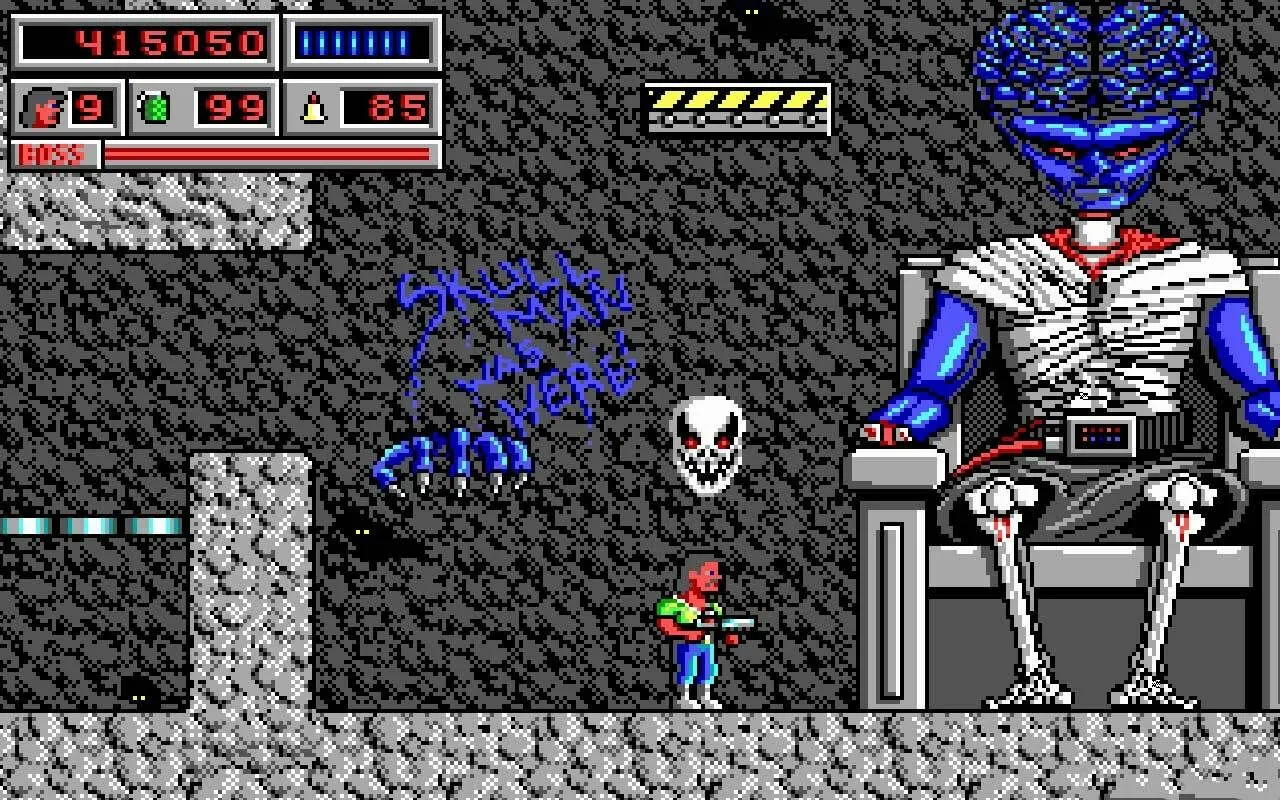 Màn hình game Bio Menace với hình ảnh quái vật người ngoài hành tinh đầu to, minh họa đồ họa chi tiết.