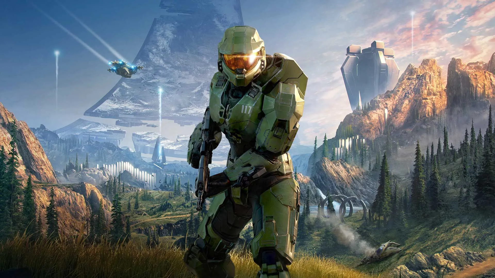 Master Chief cầm vũ khí trong khu vực cỏ và rừng trên vòng nhẫn trong Halo Infinite